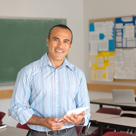 teacher with booklet